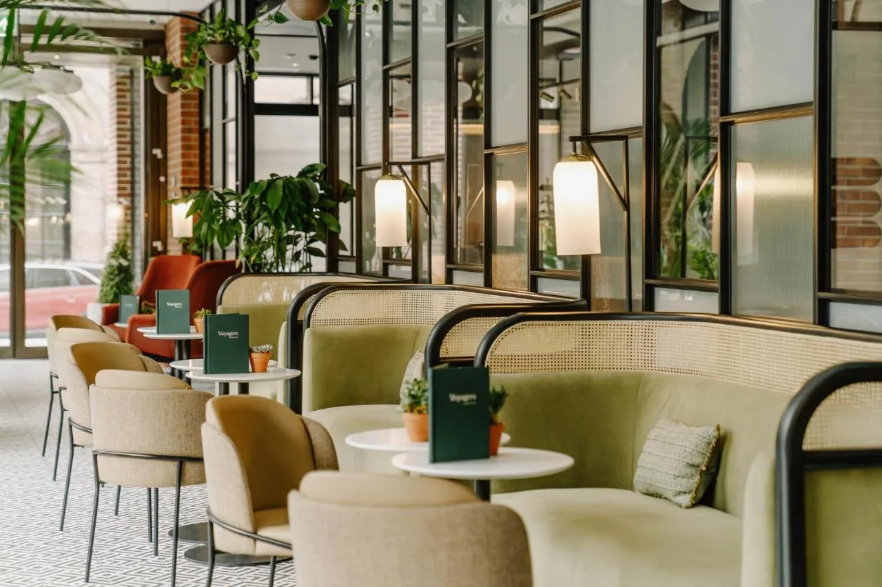 a row of tables and chairs in a restaurant at The Halyard Liverpool, Vignette Collection by IHG in Liverpool